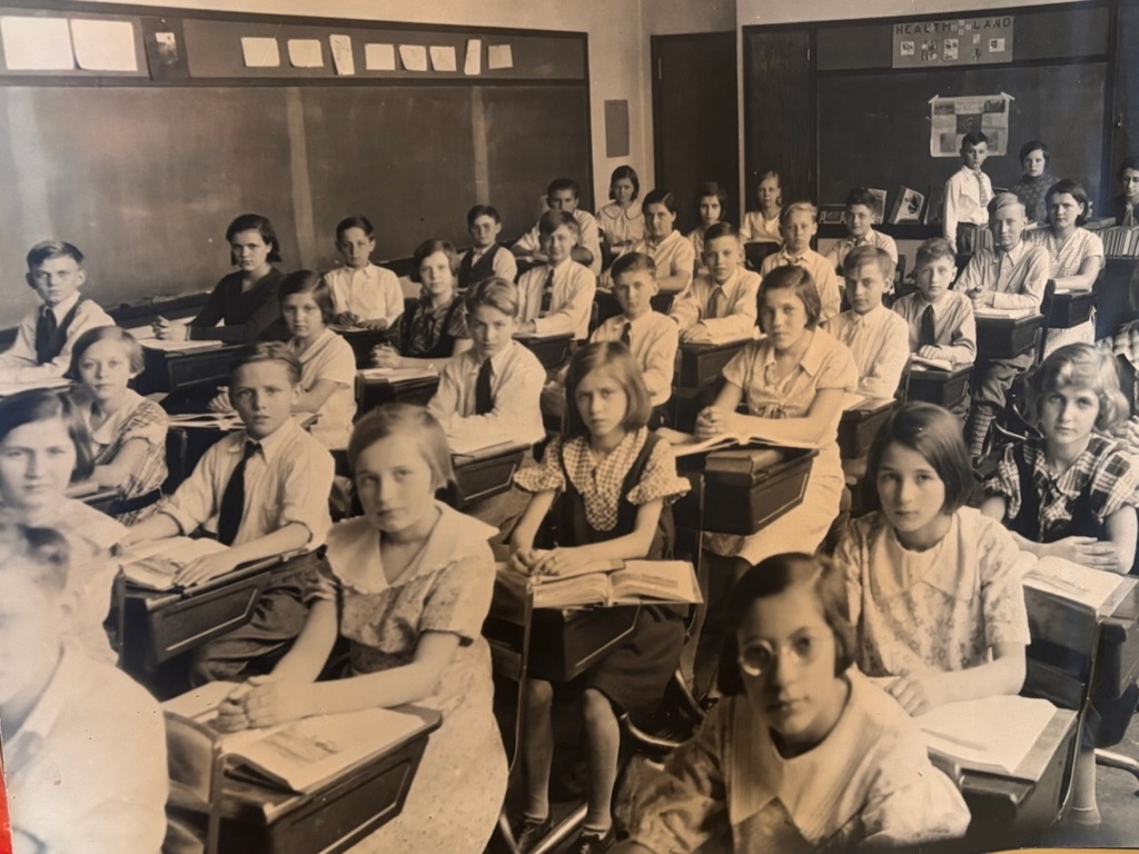 vintage photo of students sitting in classroom inside woodrow wilson classroom