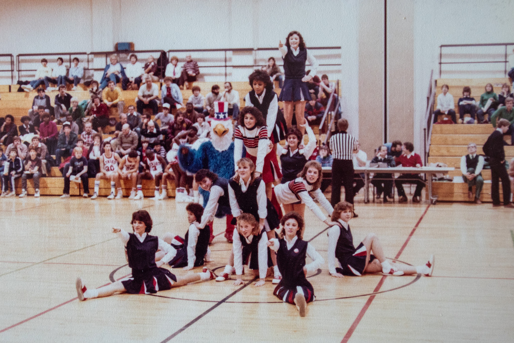 binghamton high school patriotic eagle mascot performs with cheerleaders in 1980s photo
