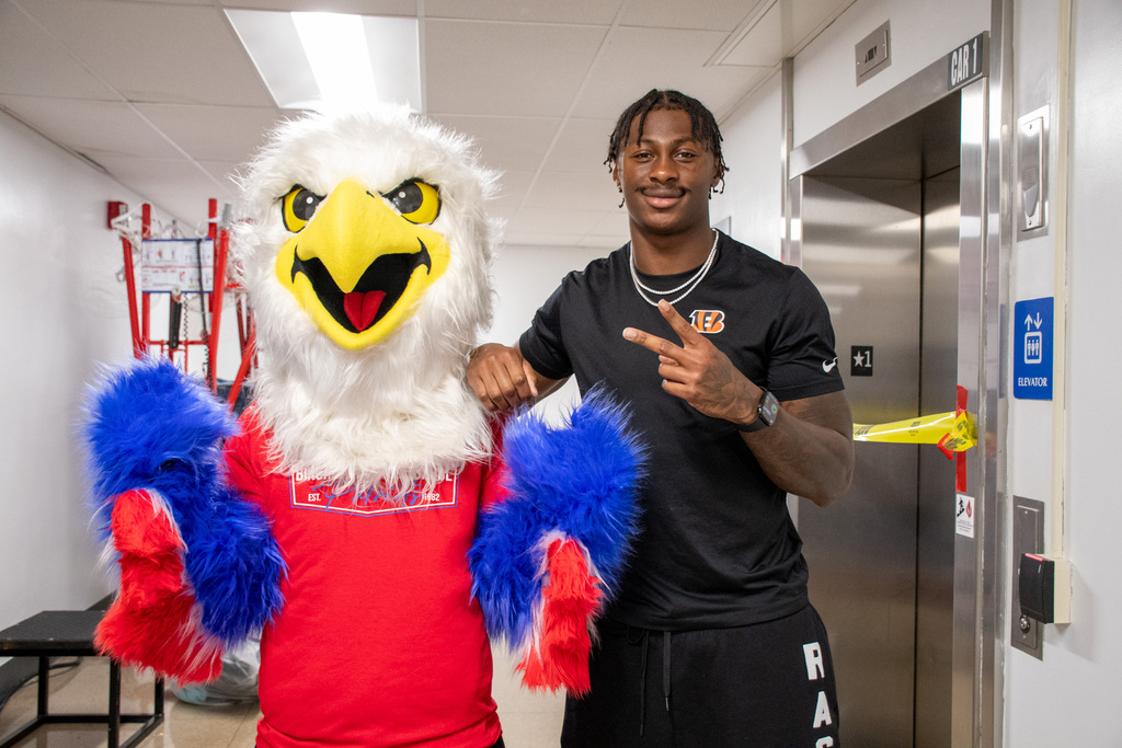 bhs patriotic eagle mascot swoop poses for photo with cincinnati bengals player colbie young