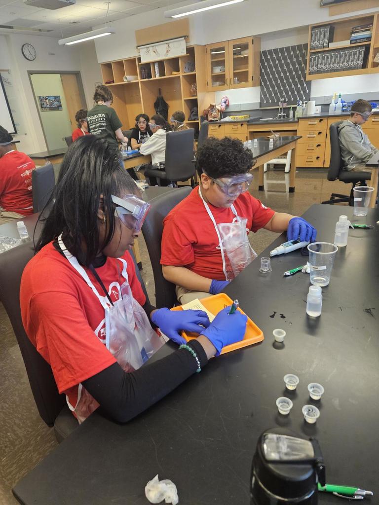 students doing science experiment