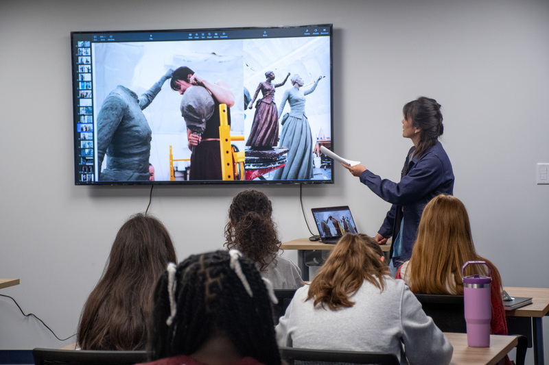 artist zoe dufour shows photos of her sculpting the harriet tubman statue that now stands in downtown binghamton
