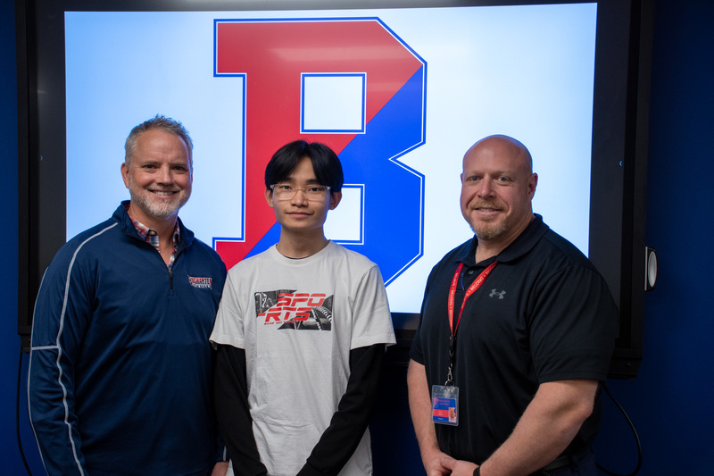 hunt chio poses for photo with bhs principal kevin richman and school counselor glenn whittington