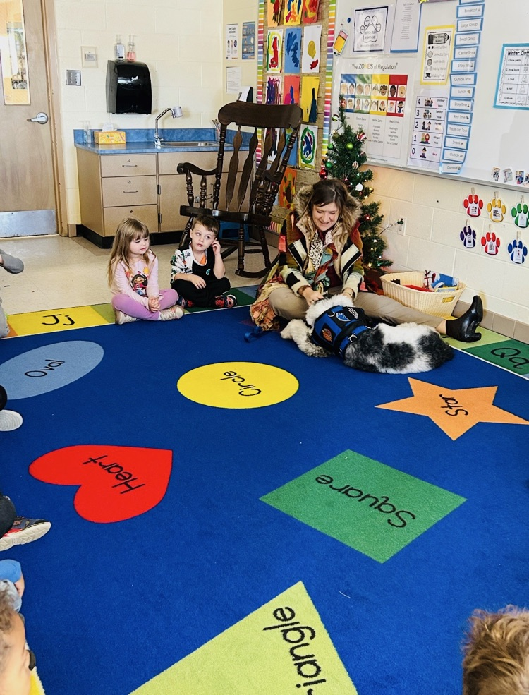 Miss Berg reads to the students and Nova.