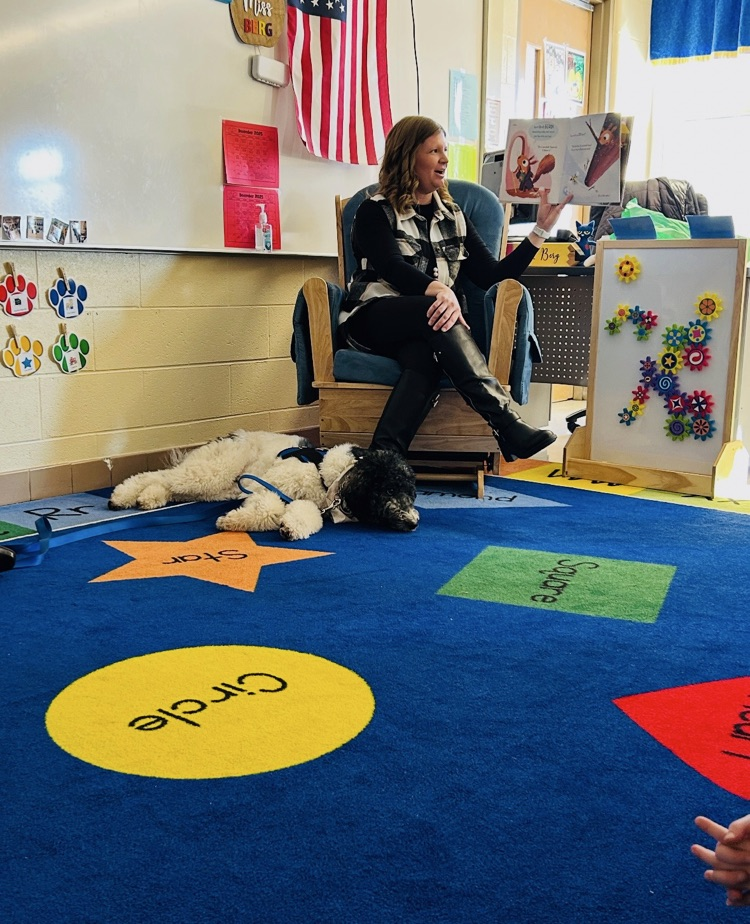 Miss Berg reads to the students and Nova.