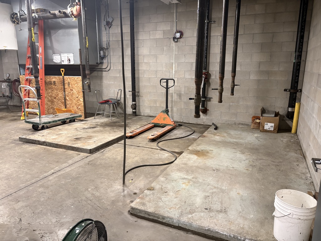 Image from the boiler room at Birch Run High School where the old boilers have been removed.