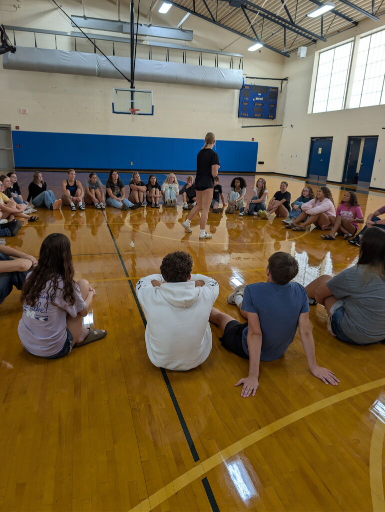 Student Council picture of students playing circle game