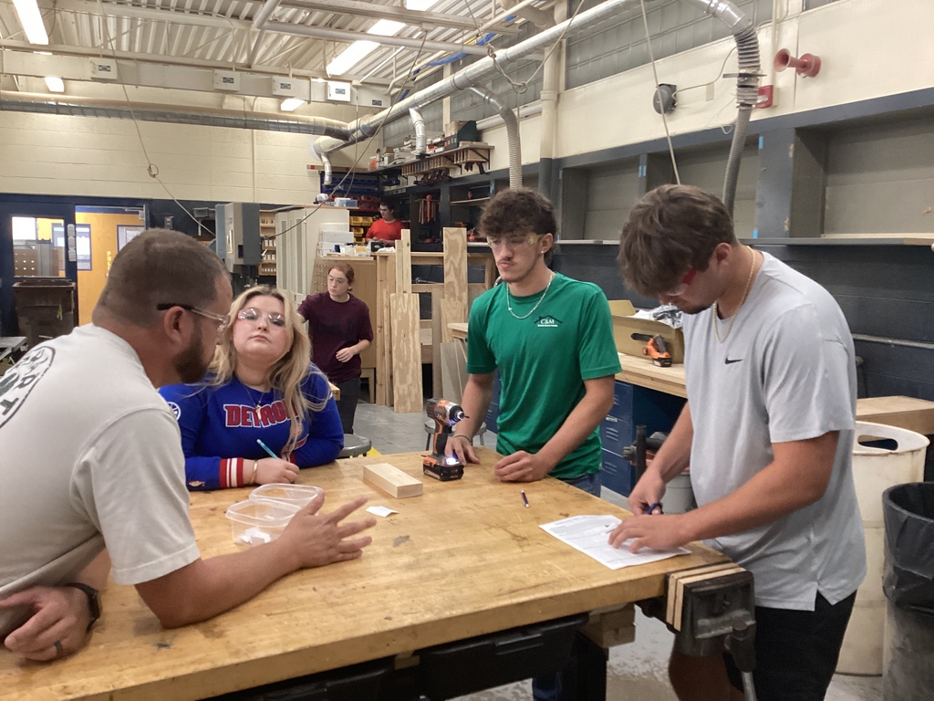 Students being instructed by Mr. Grady