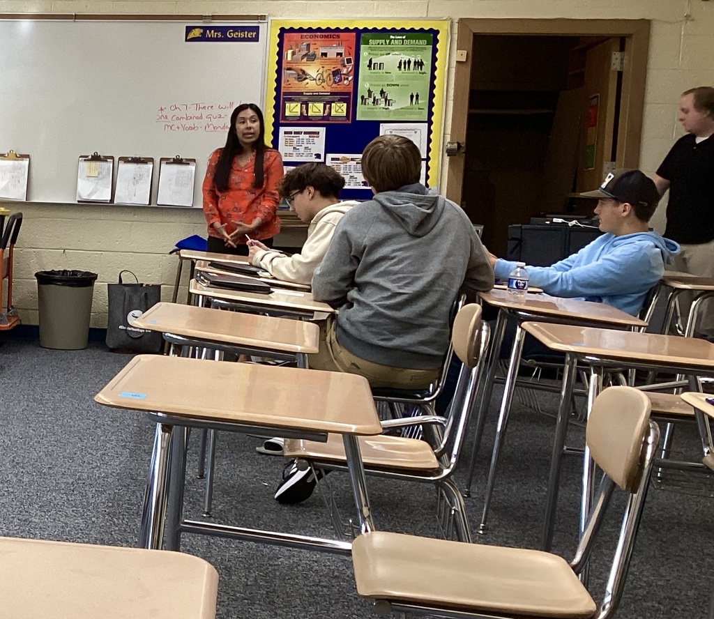 Mrs. Guerra teaching students about voting laws