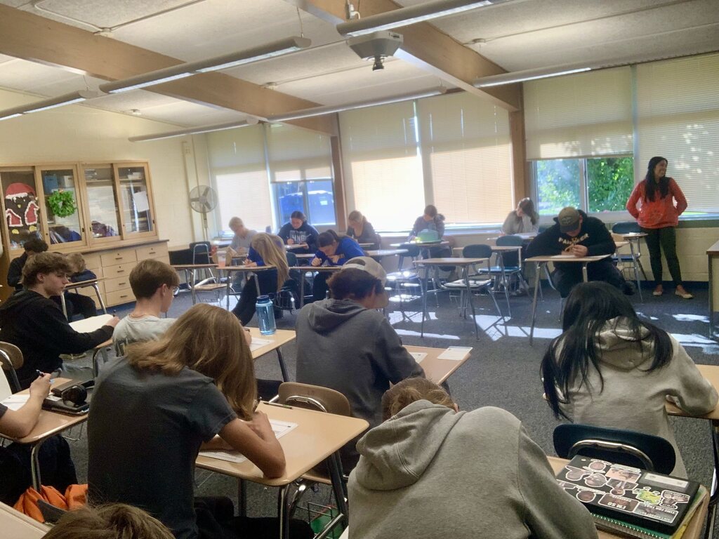 students filling in ballots