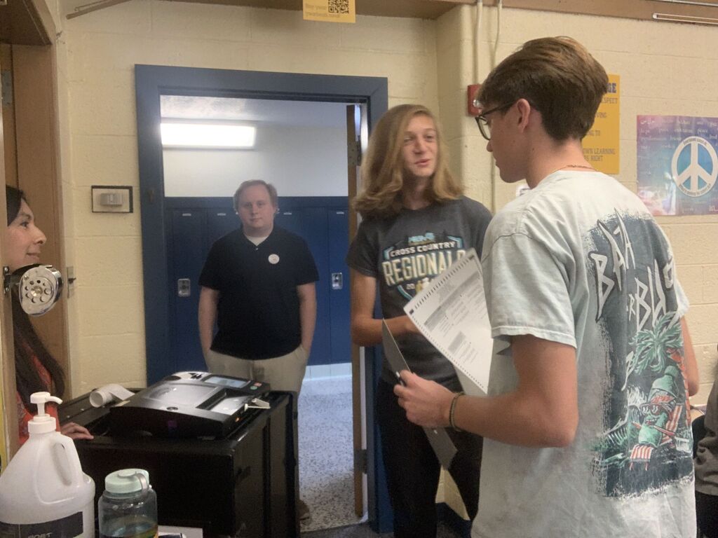 Students casting Ballots
