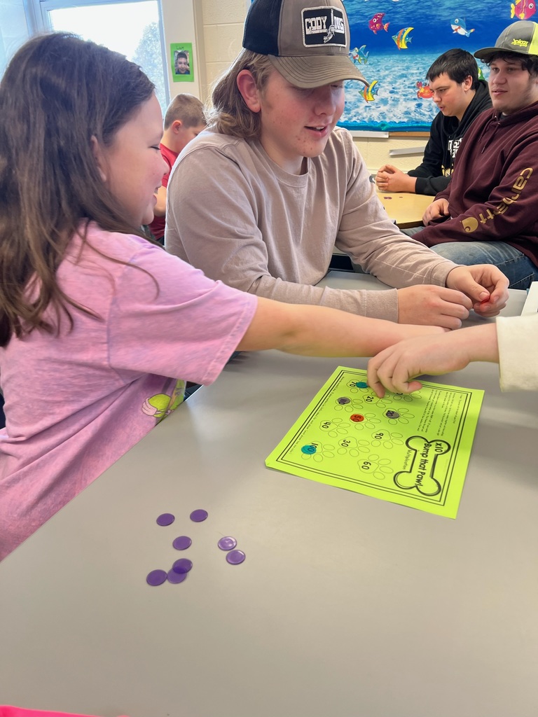 Fourth Grade students played Math games with high school support.