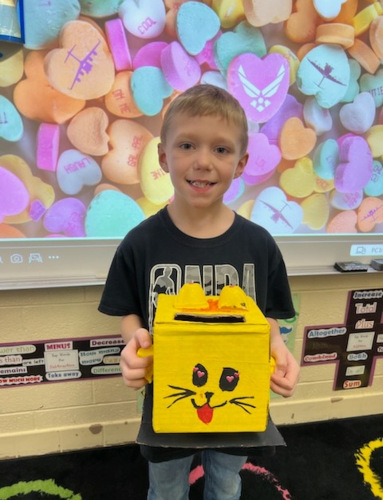 first grade boy with Valentine Box