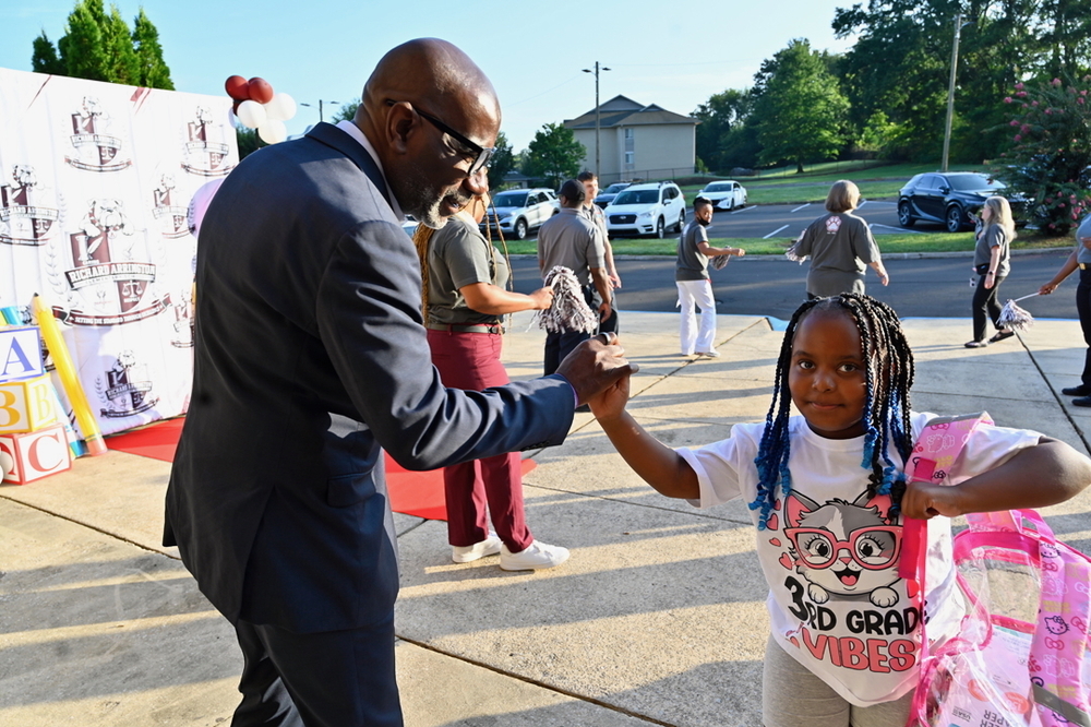 Superintendent Dr. Mark Sullivan greets an Arrington Elementary School scholar on the first day of school!