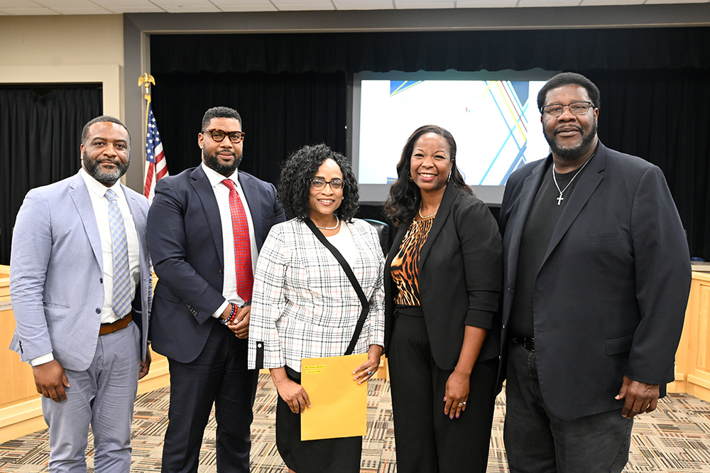 Shawna McGriff (center) of Oxmoor Valley Elementary School recognized by Birmingham Board of Education
