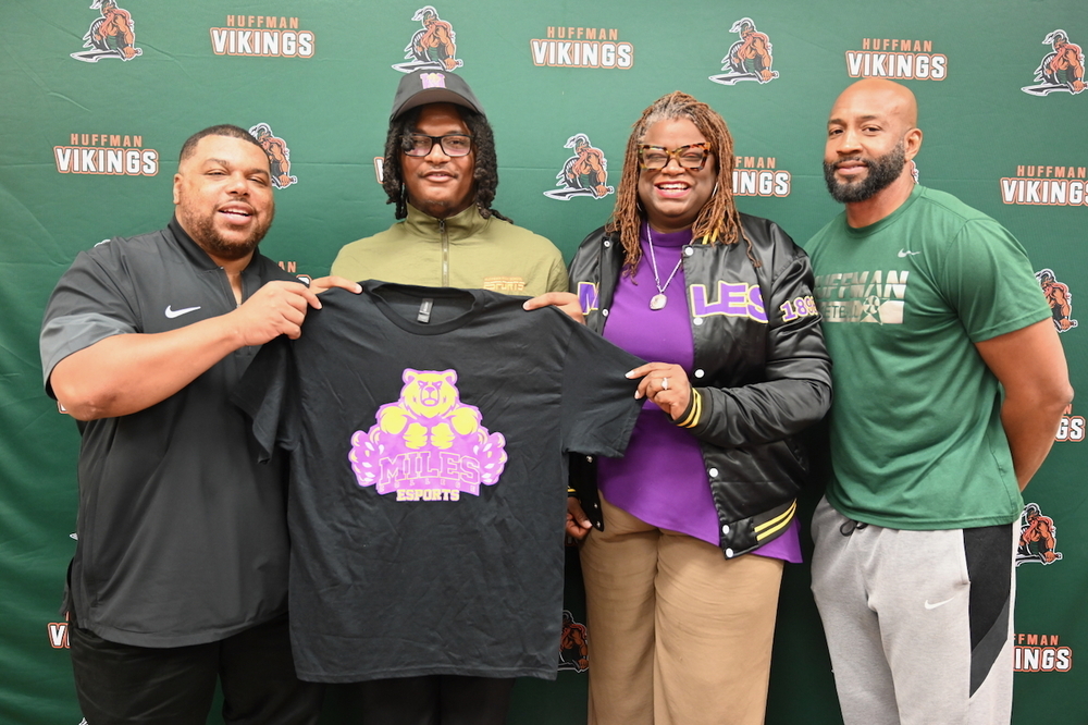 Huffman Esports Coach Justin Hackett, Carlos Smith, Dr. Jarralynne Agee of Miles College, and Huffman Athletic Director Greg Ward