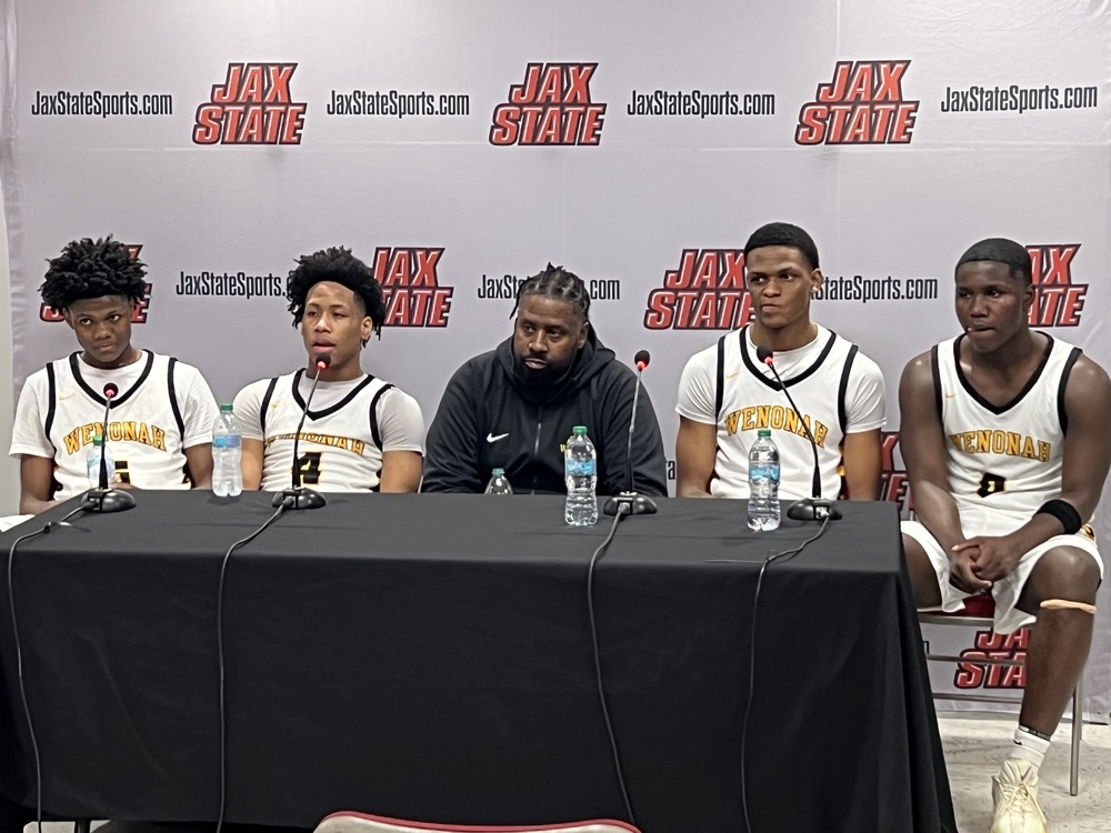 Wenonah boys basketball team at post-game press conference