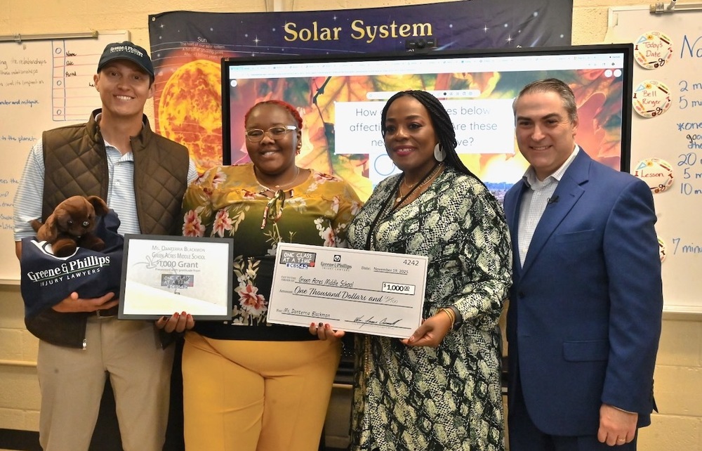 Greyson Breal of Greene & Phillips, Green Acres Teacher Danerria Blackmon and Principal Dr. Princess Jones, and CBS 42 Chief Meteorologist Dave Nussbaum