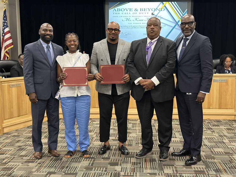 Board Member James Sullivan, A.H. Parker Counselors Kian Threadgill and John Edwards and Principal Darrell Hudson, and Superintendent Dr. Mark Sullivan