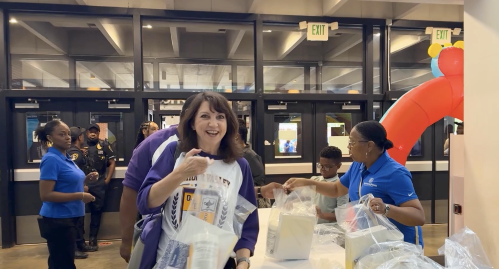 Teachers receive supply bags