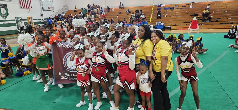 Sun Valley and West End cheer squads share the Grand Champion banner!