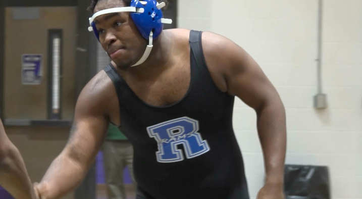 Ramsay Rams wrestler Drayden Wright shakes his opponent's hand before the start of the match. 