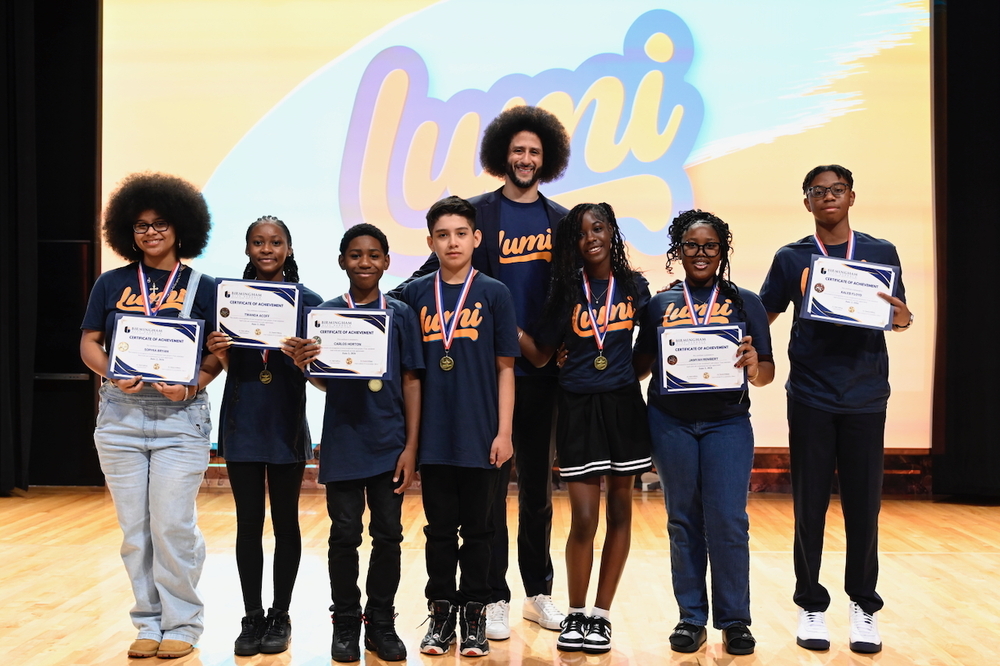 Colin Kaepernick with Birmingham City Schools scholars
