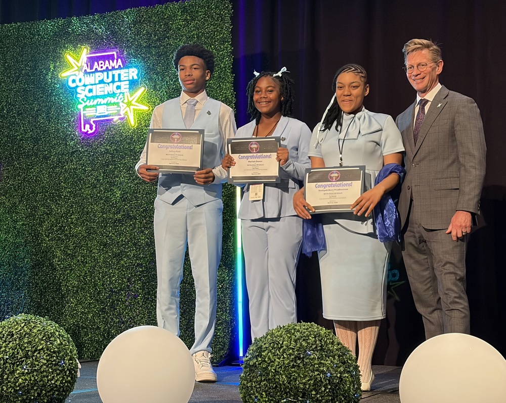 W.J. Christian's Jailen Mott, Mariah Owens and Saniyah Horn-Prudhomme  with Alabama State Department of Education Superintendent Dr. Eric Mackey