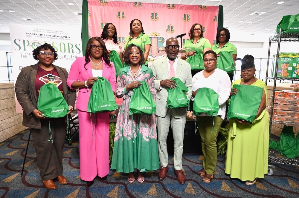 Dr. Mark Sullivan (bottom row third from right) with Kristy Plump, BCS Community Engagement Specialist (bottom row far left) and  Dr. Angela Day (top row far right)