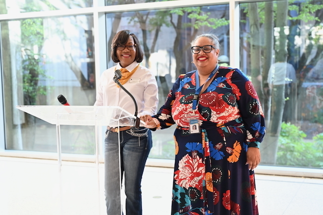 BCS Human Resources Officer Dr. Corvetta Clasberry and Strategic Partnerships and Community Engagement Coordinator Adrianne Marbury address the audience.