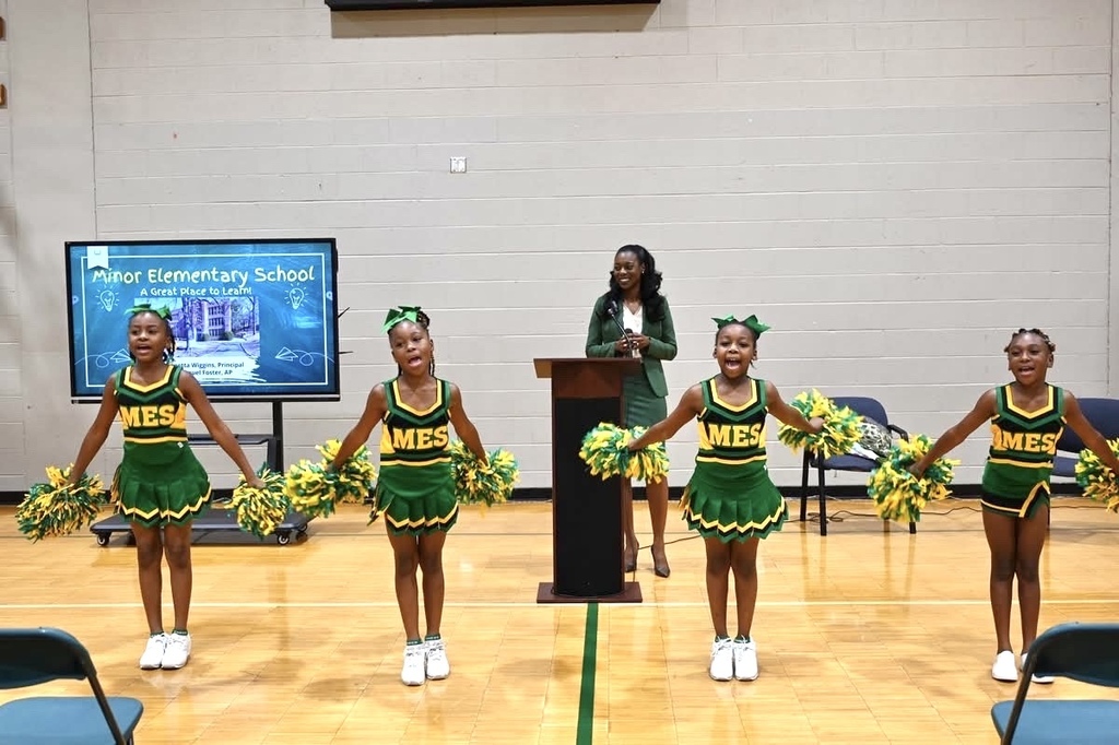 The Minor Cheer Squad welcomes Dr. Wiggins