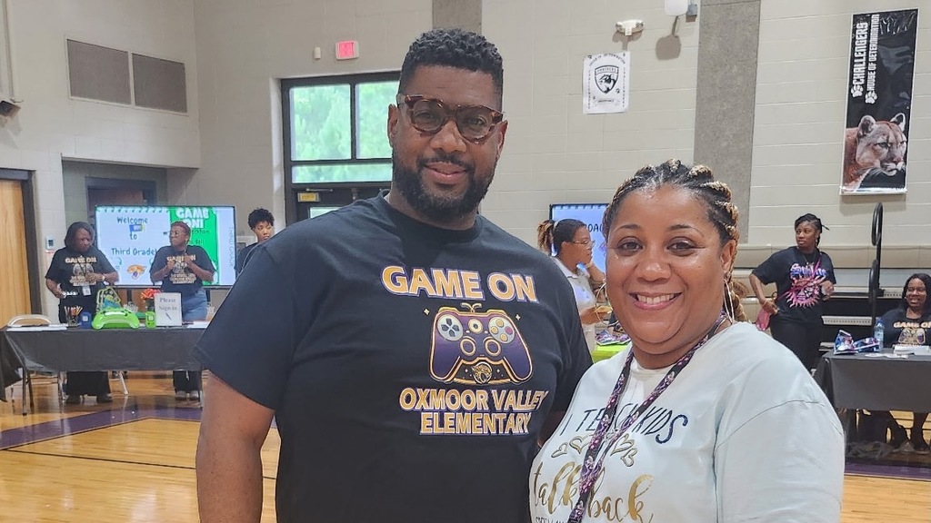 Principal Dr. Melvin Love (left) at the Game On back to school rally