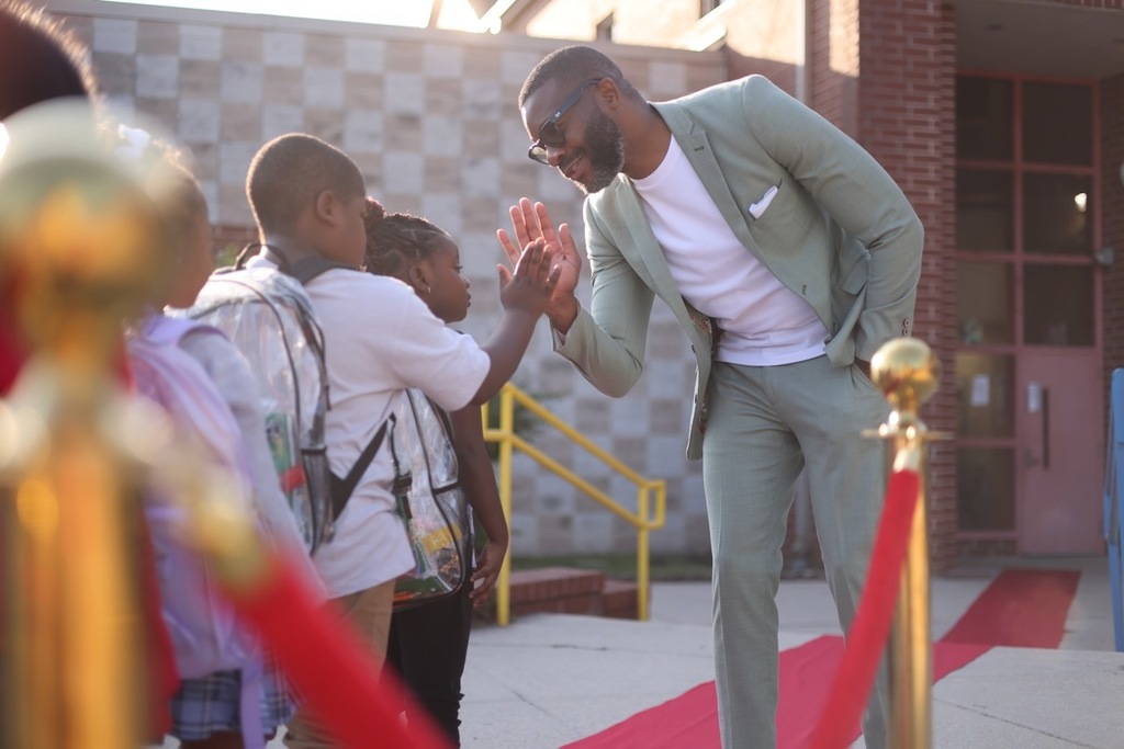 Mayor Randall Woodfin greets our scholars on the first day of school.