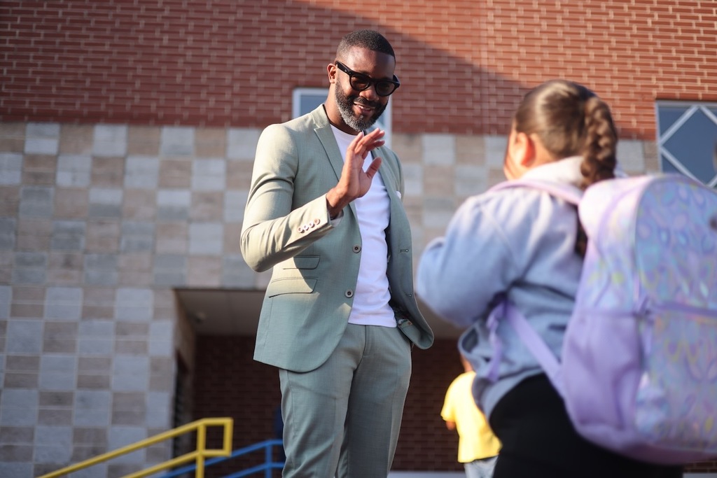 Mayor Randall Woodfin greets our scholars on the first day of school.