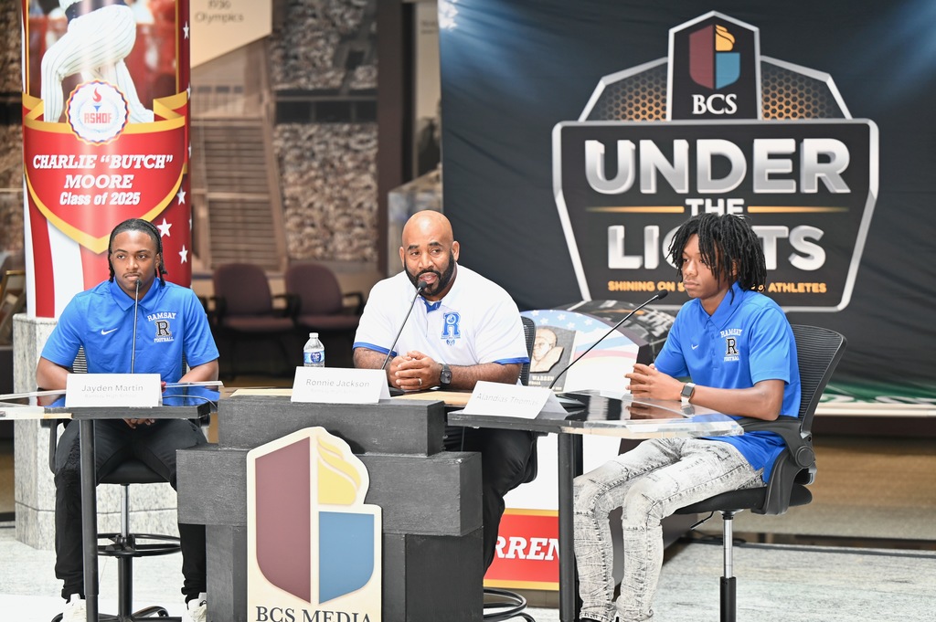 (left to right) Jayden Martin, Coach Ronnie Jackson, and Alandias Thomas look to return to the state championship game in the 2025 season.