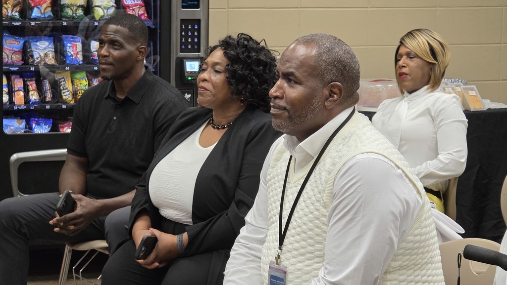 Board Member Sherman Collins, BCS Chief Academic Officer Pamela Williams, and Huffman Principal John Lyons