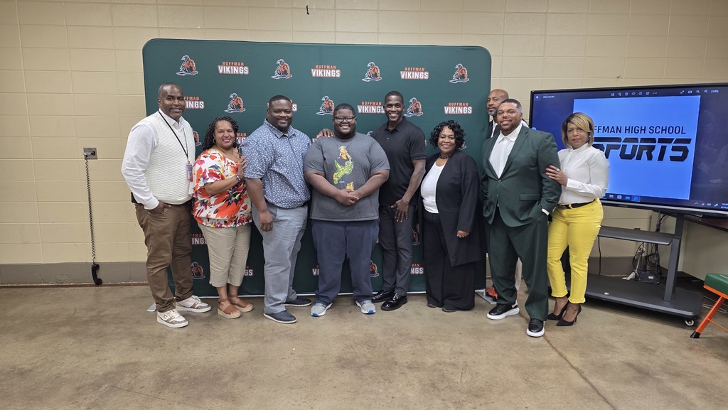 Robert Miller flanked by family and BCS friends