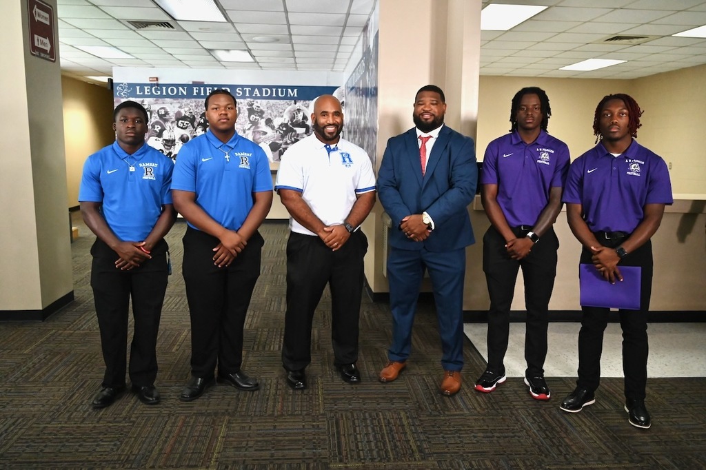 (left to right) Ramsay's Jarred Brundidge, James Reynolds, and Coach Ronnie Jackson, Parker Coach Frank Warren with players Dylan Reese and Chancellor Sparks