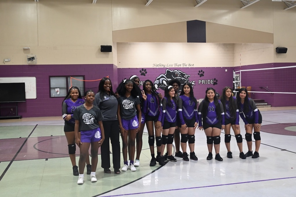 members of the cheer squad and volleyball team