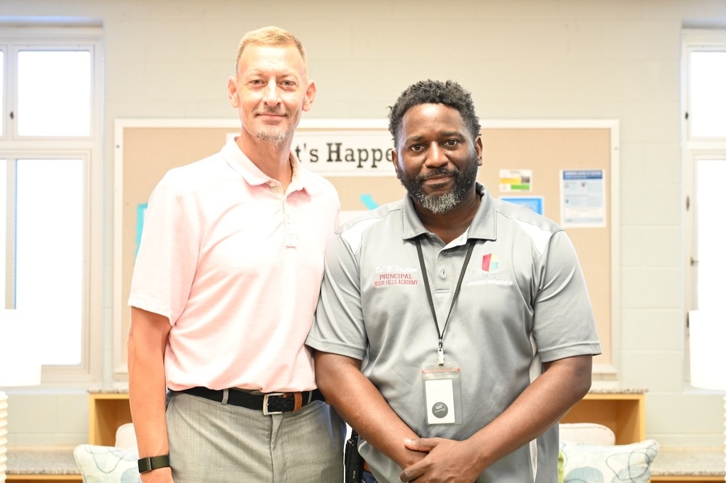 Principal Phillips (right0