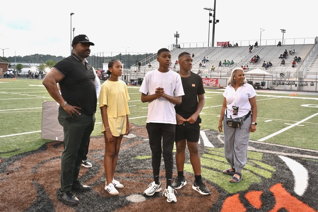 Dareus and his family watch a montage of highlights