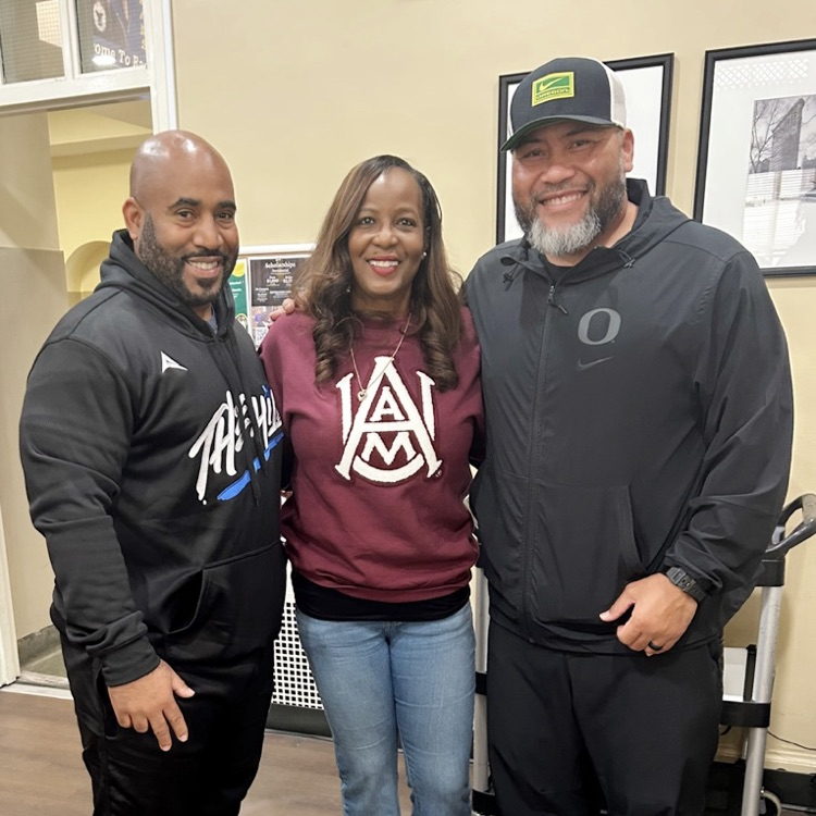 Ramsay Coach Ronnie Jackson and Principal Carolyn Russell-Walker with Oregon Coach Tony Tuioti