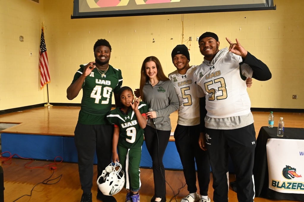 Third grader E'mmani McDade (9) in full Blazer gear!