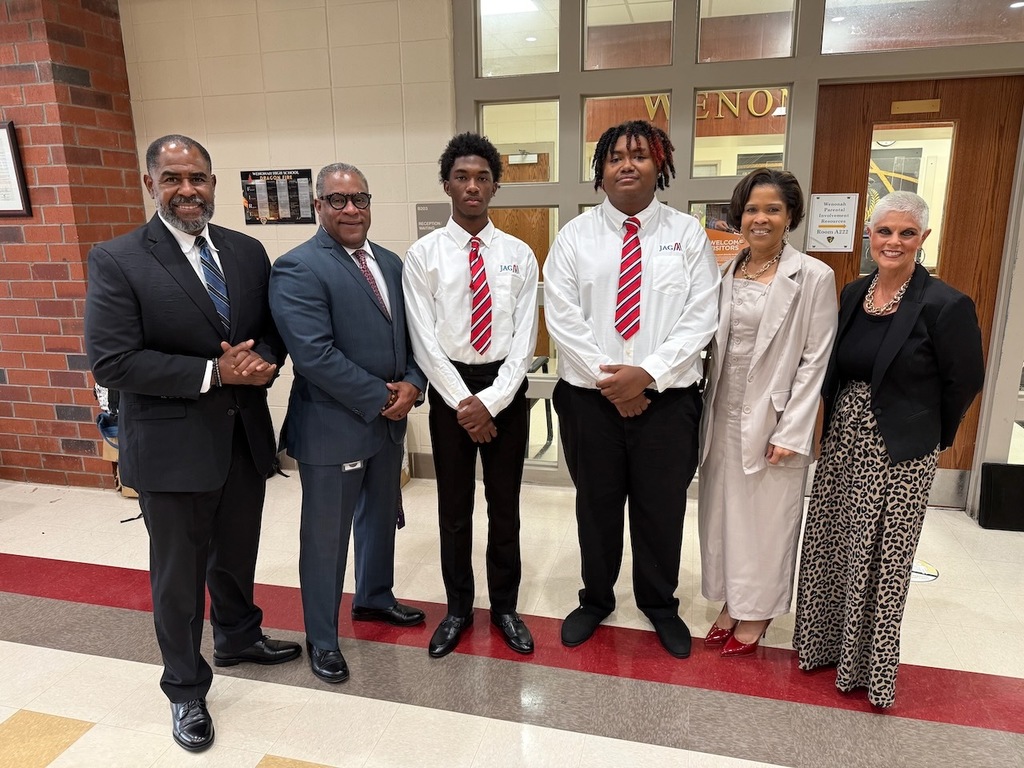 State Representatives Craig Collins (far left) and Mandy Nicols (far right) 