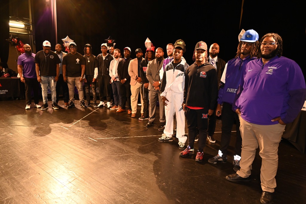 Thunder Herd signees and coaches