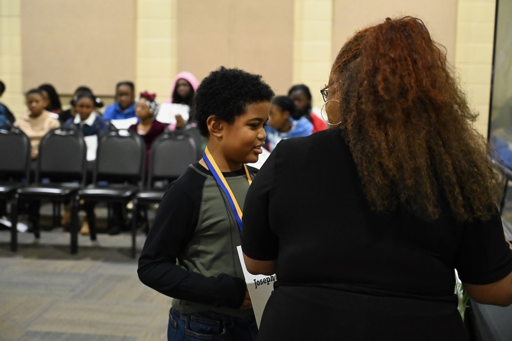 Joseph receives his medal!