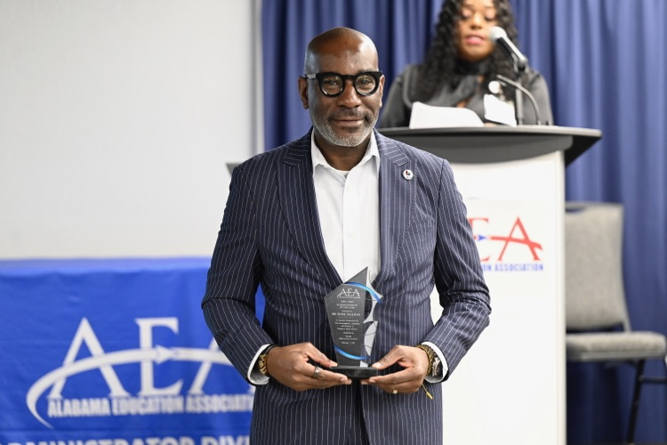 Superintendent Dr. Mark Sullivan received the Outstanding Superintendent of the Year Award from the Alabama Education Association during an award ceremony this morning!