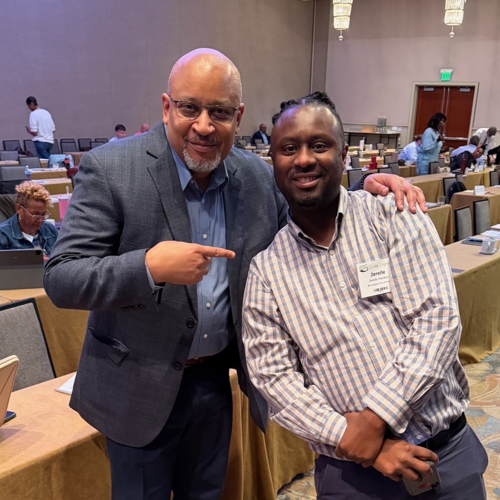 Student Success Department's Jerelle Herndon with Principal Baruti Kafele