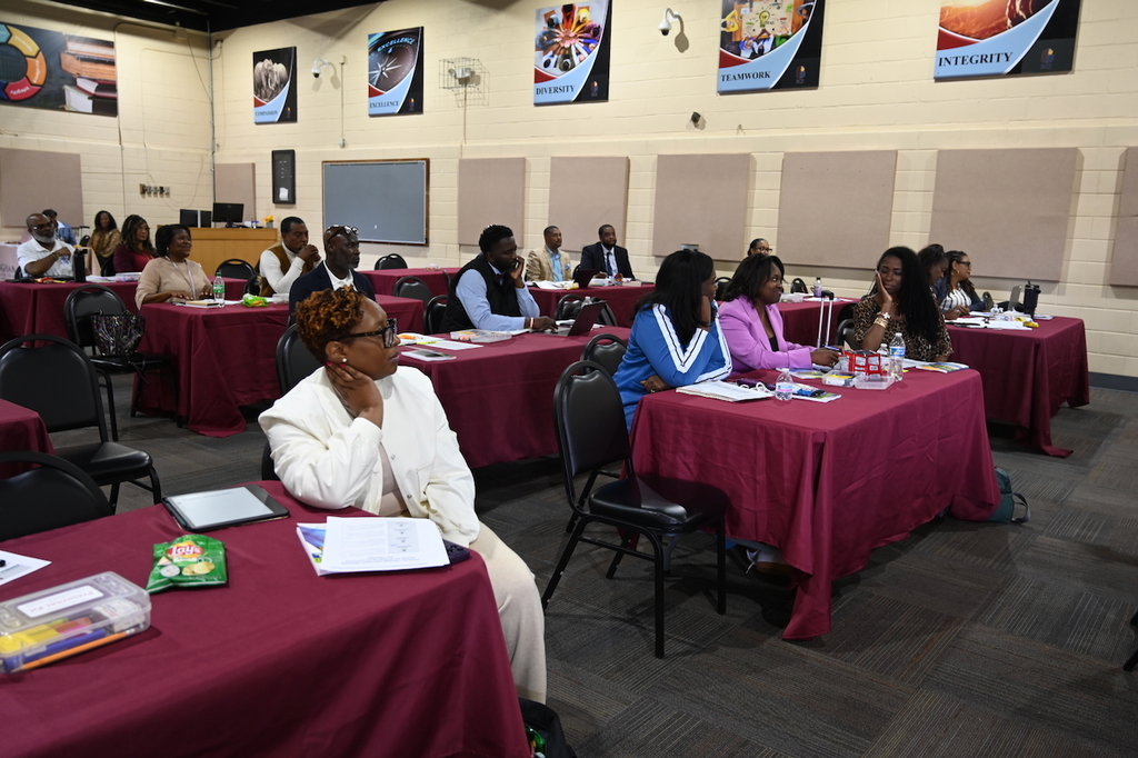 Our principals listen during professional development seminar. 