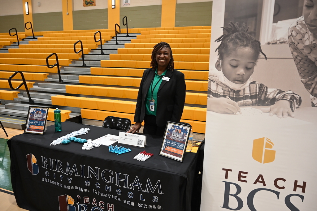 HR's Livia Pleasant representing Teach BCS at the Woodlawn High School College & Career Fair