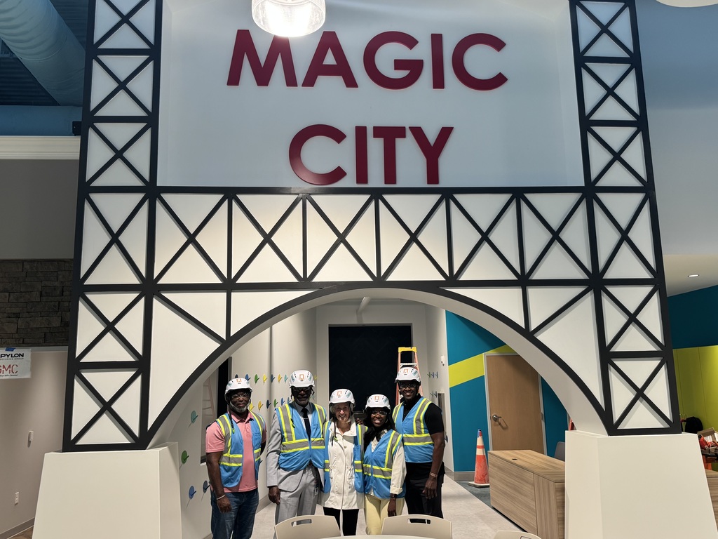 Superintendent Dr. Mark Sullivan (second from left) with Board Members Derrick Billups, Mary Boehm, and Yamika Foy and Board President Sherman Collins